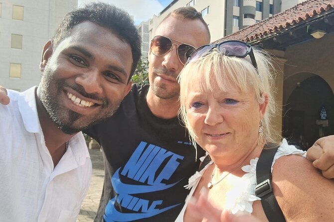 Colombo tuk tuk city tour -Entry Fees, and food Included - Beira Lake and Independence Memorial Hall: calm water and the freedom flame