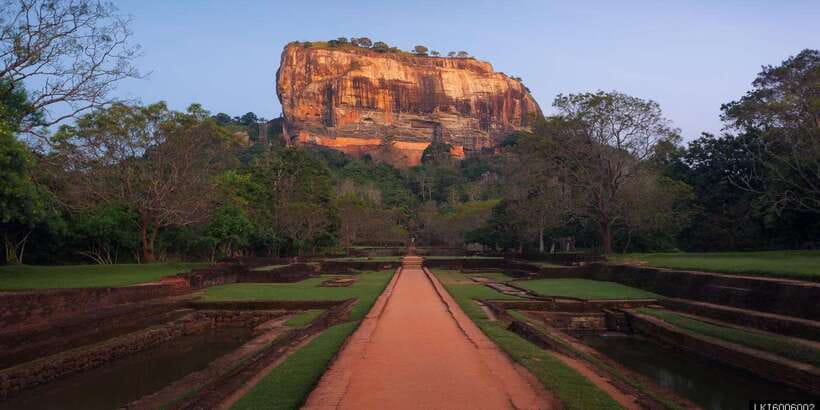 From Kandy: Sigiriya and Dambulla Private Day Tour - Dambulla Golden Temple: cave cool, giant Buddha, and five main caves