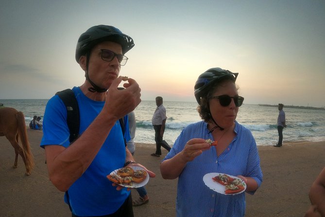 Luxury Night Cycle Tour of Colombo - Gangaramaya Temple and the Beira Lake calm