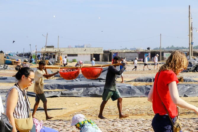 Negombo City Tour by Tuk Tuk - Lagoon fishing from the bridge: rods, nets, and quiet bustle