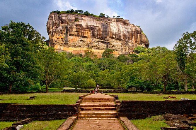 Sigiriya city tour from Negombo & Colombo with traditional Lunch. - Dambulla Cave Temple: murals, Buddha statues, and UNESCO scale