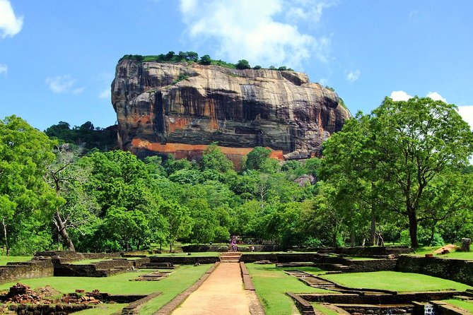 Sigiriya Dambulla Day trip from Kalutara Bentota Wadduwa Beruwala - Golden Temple of Dambulla: cave art, statues, and a rock that dominates the plains
